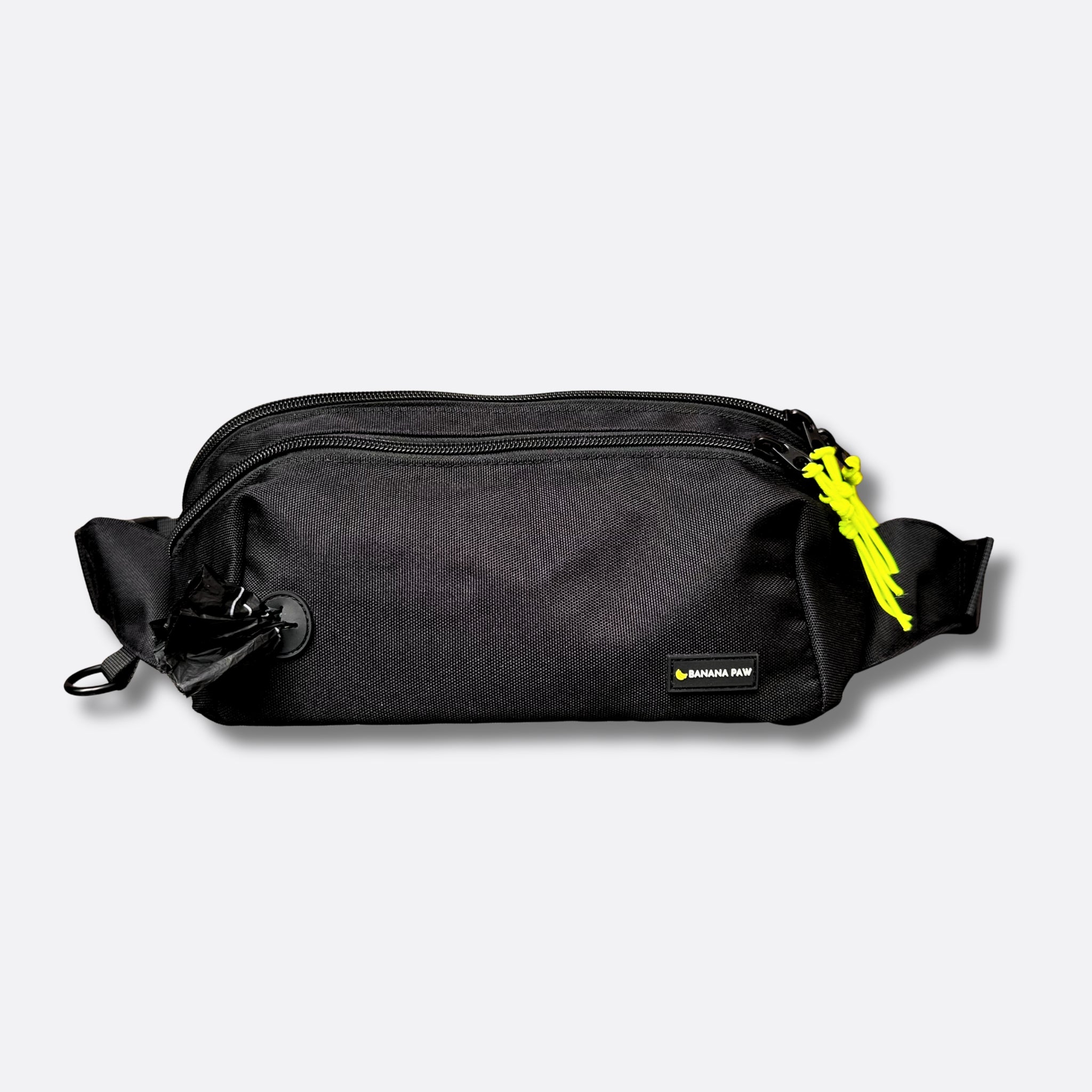Bauchtasche Rio in Schwarz aus Nylon, Vorderansicht mit Reißverschluss, neongelben Zugbändern und Beutelausgang